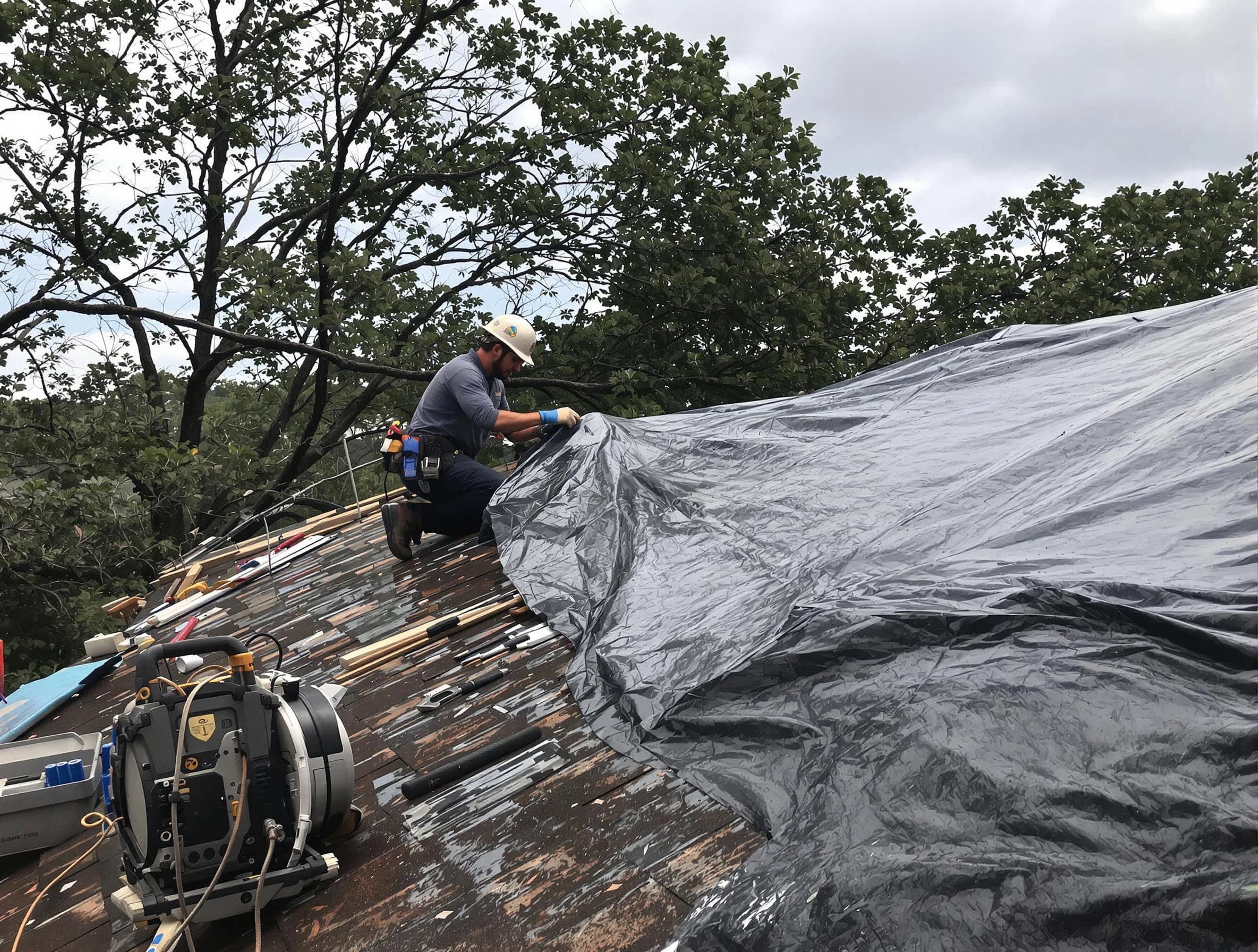 Barberton Roofing Company responding to an emergency roof repair call in Barberton, OH