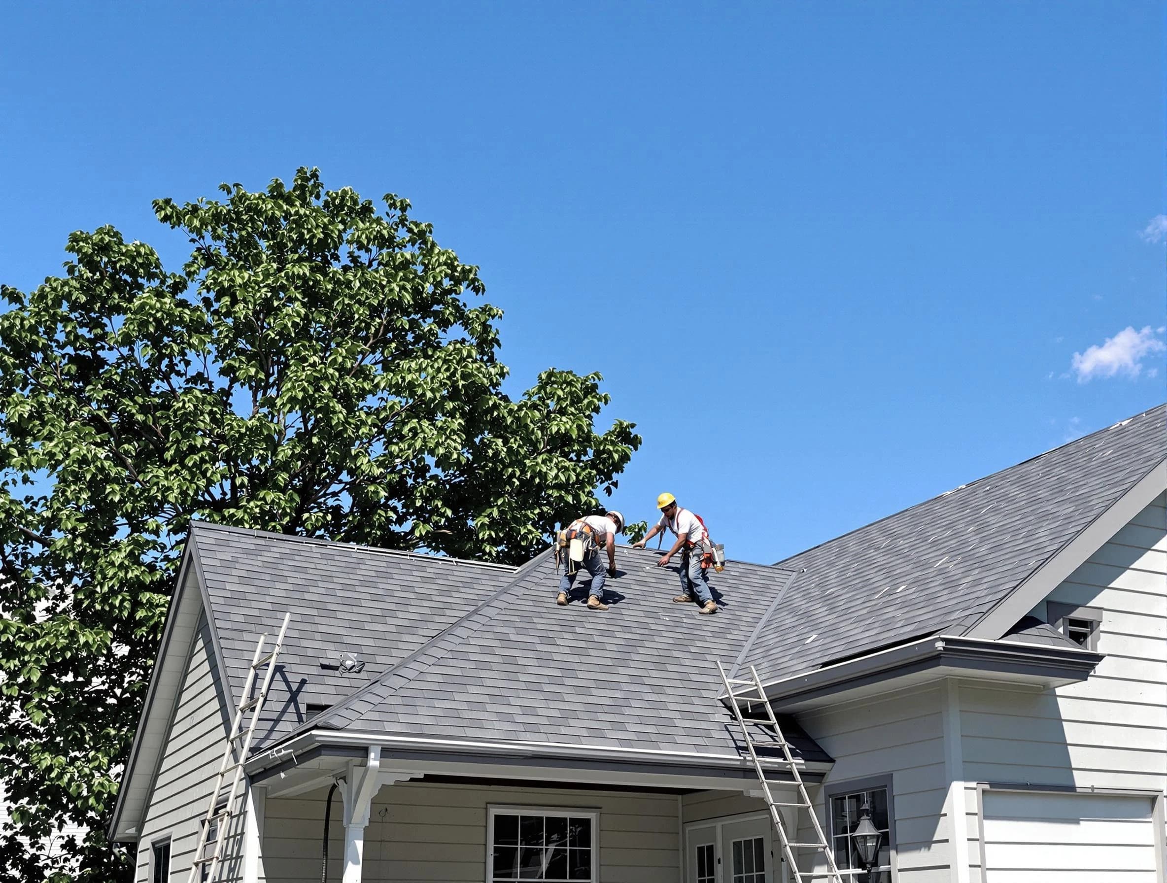 Barberton Roofing Company crew finalizing a roof installation in Barberton, OH