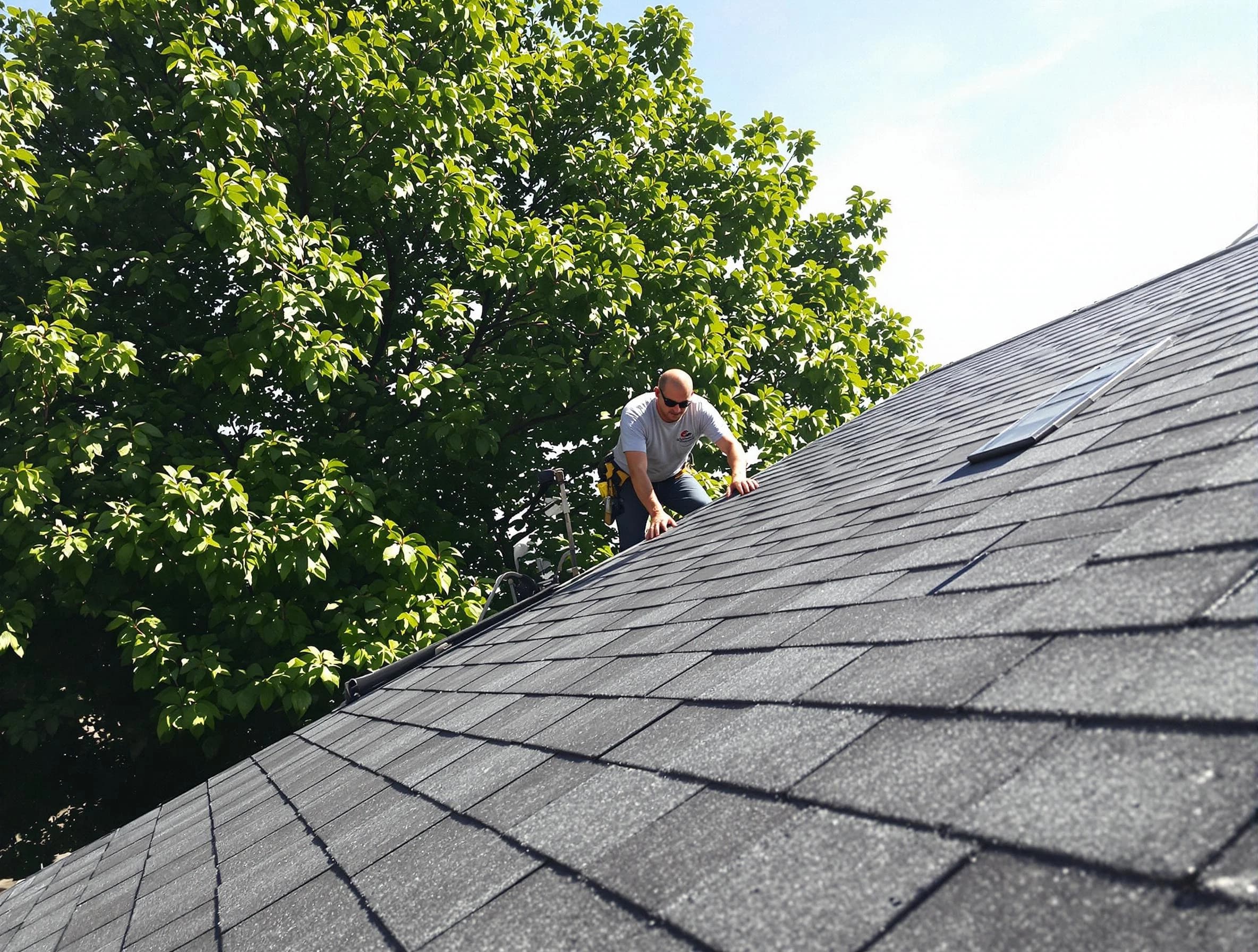 Certified roofers from Barberton Roofing Company working in Barberton, OH